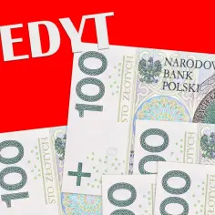 Kredyt na zakup działki. Polskie banknoty 100 zł symbolizują finansowanie marzeń o własnym kawałku ziemi.